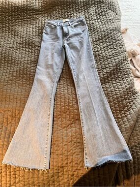 Frame Denim Light Blue Flare Jeans with Raw Hem